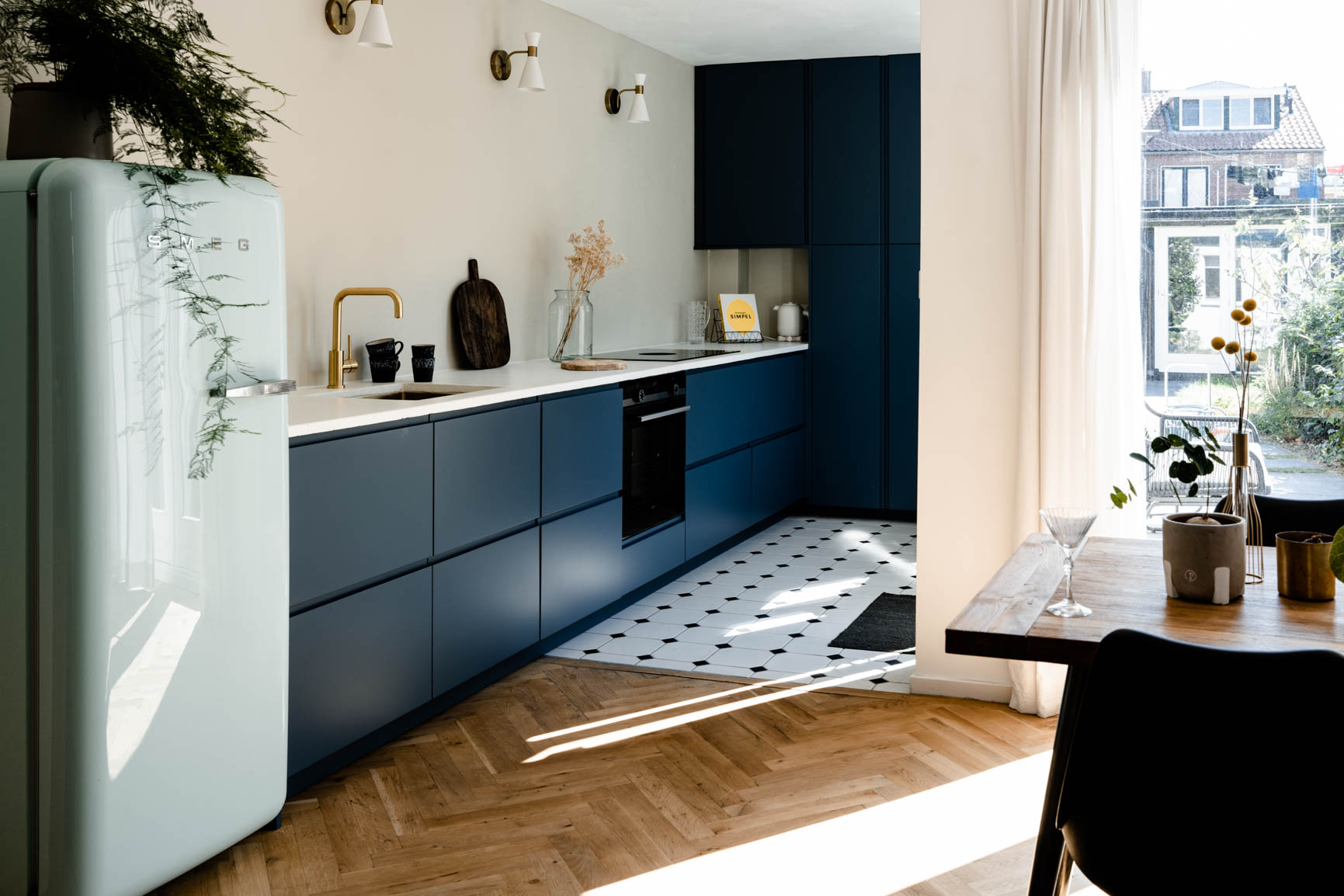 Farrow and Ball Mizzle kitchen fronts by BABOON AMSTERDAM