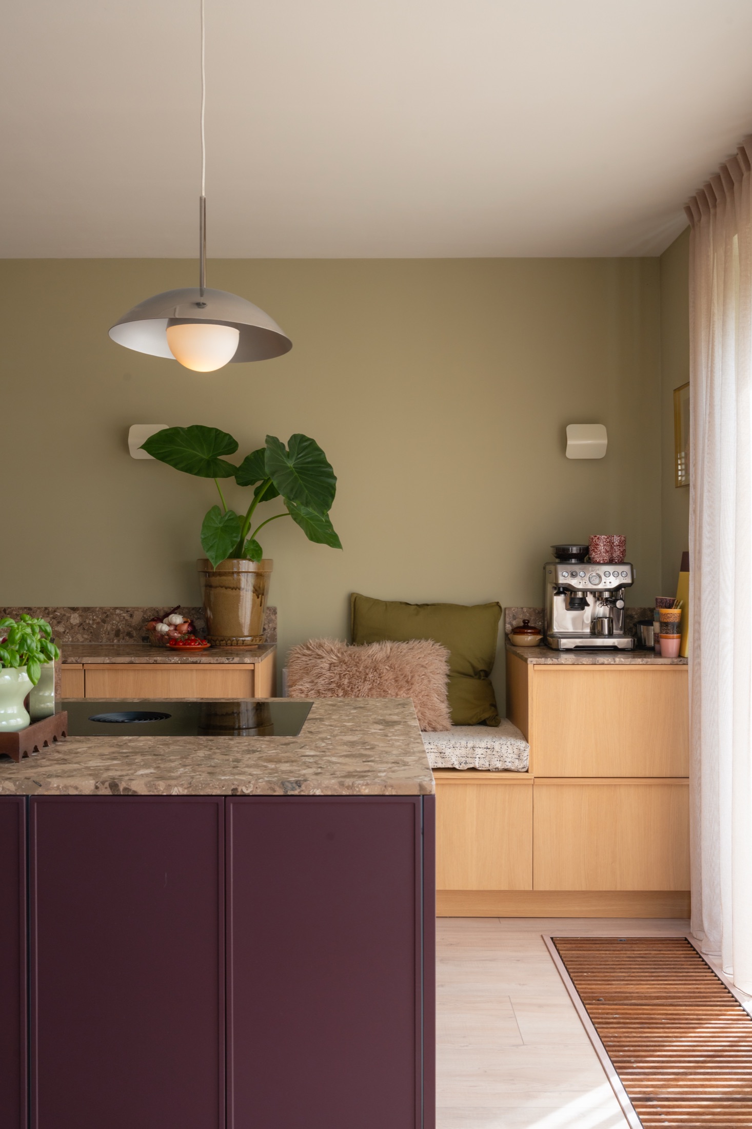 Anouk at home — purple island + bench